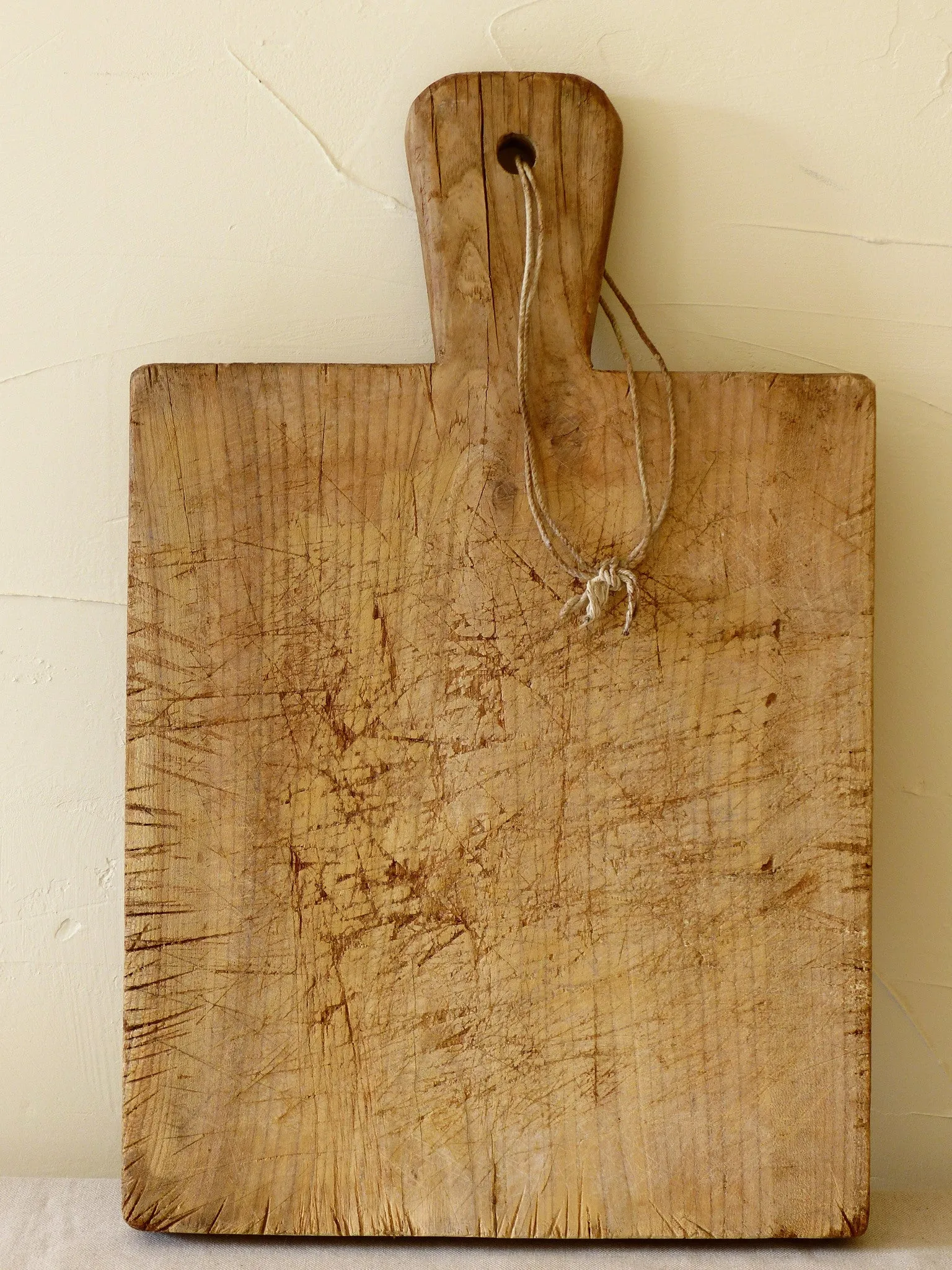 Rustic French cutting board with string