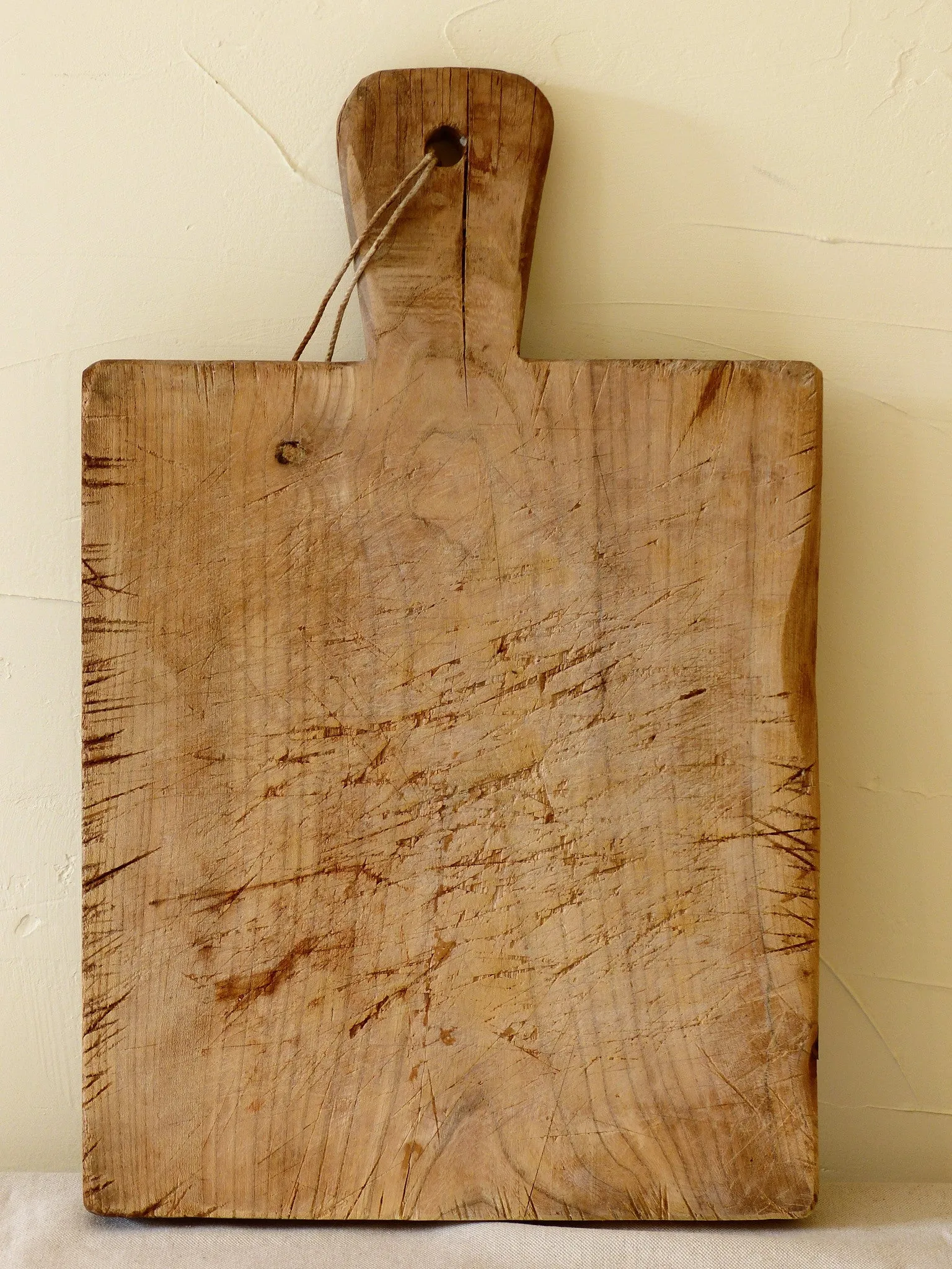 Rustic French cutting board with string